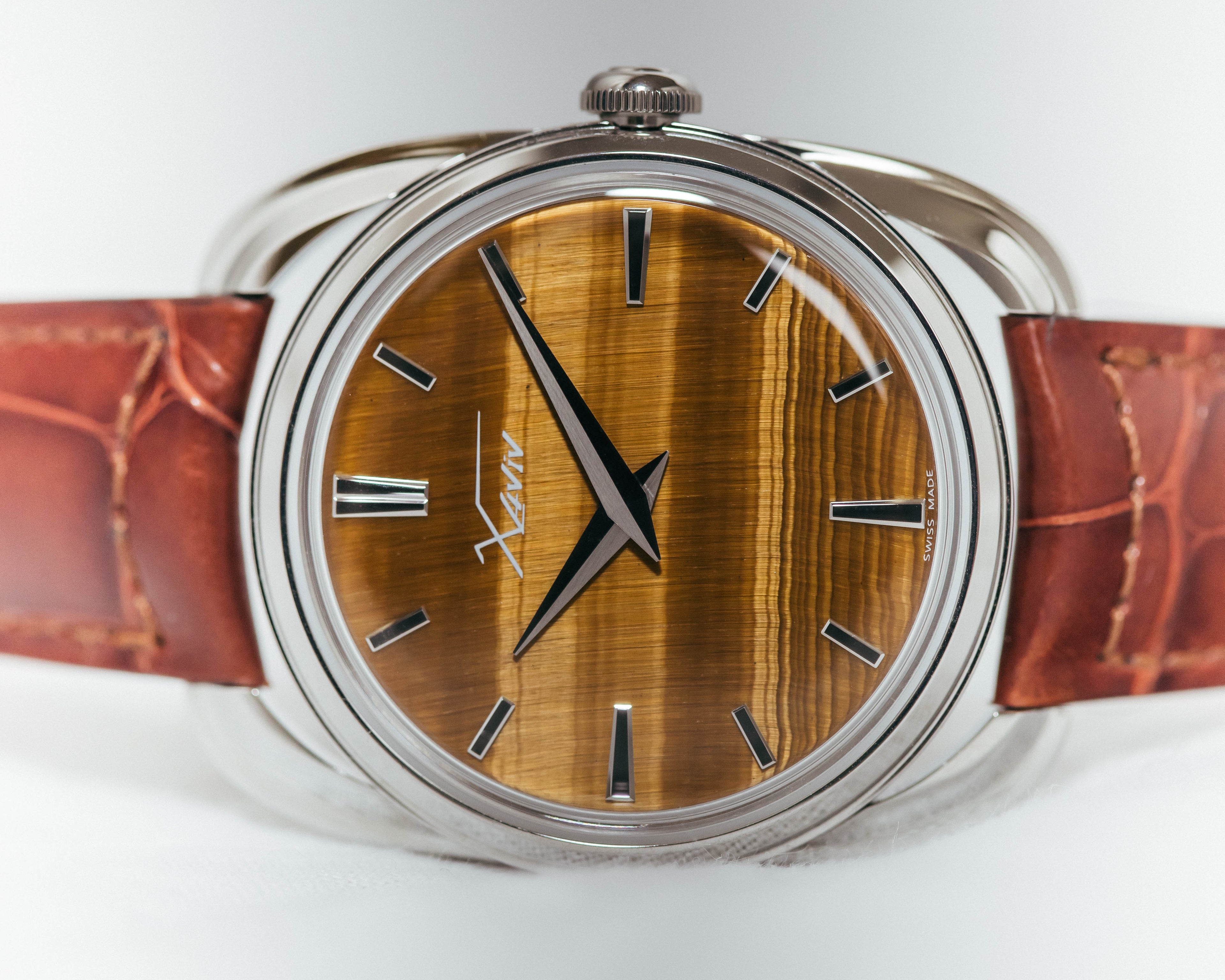 Xaviv Crablug 37 Tiger Eye Stone Dialluxury dress watch, handcrafted in La Chaux-de-Fonds, Switzerland, featuring hand-wound movement and refined design aesthetics
