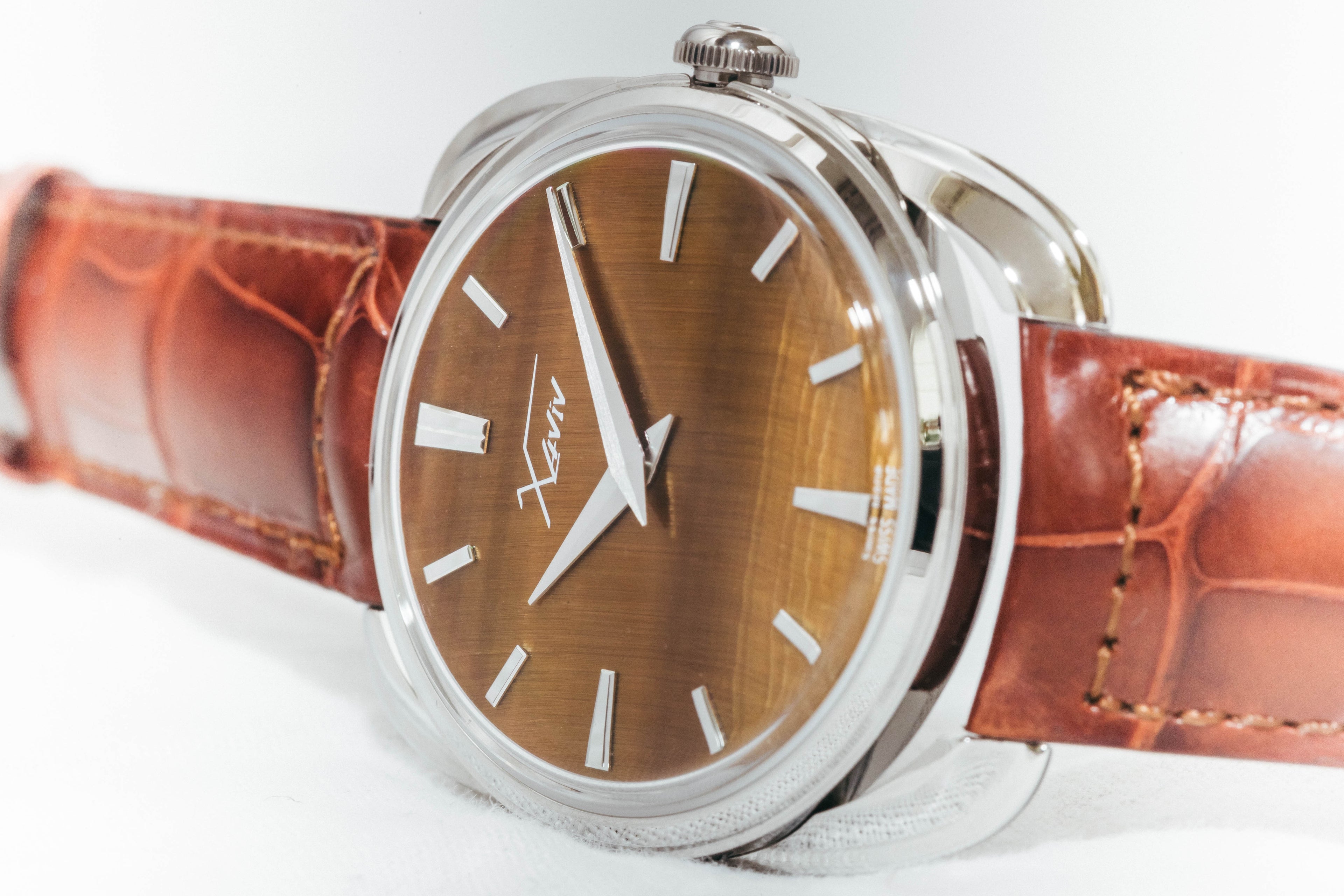 Xaviv Crablug 37 Tiger Eye Stone Dialluxury dress watch , handcrafted in La Chaux-de-Fonds, Switzerland, featuring hand-wound movement and refined design aesthetics