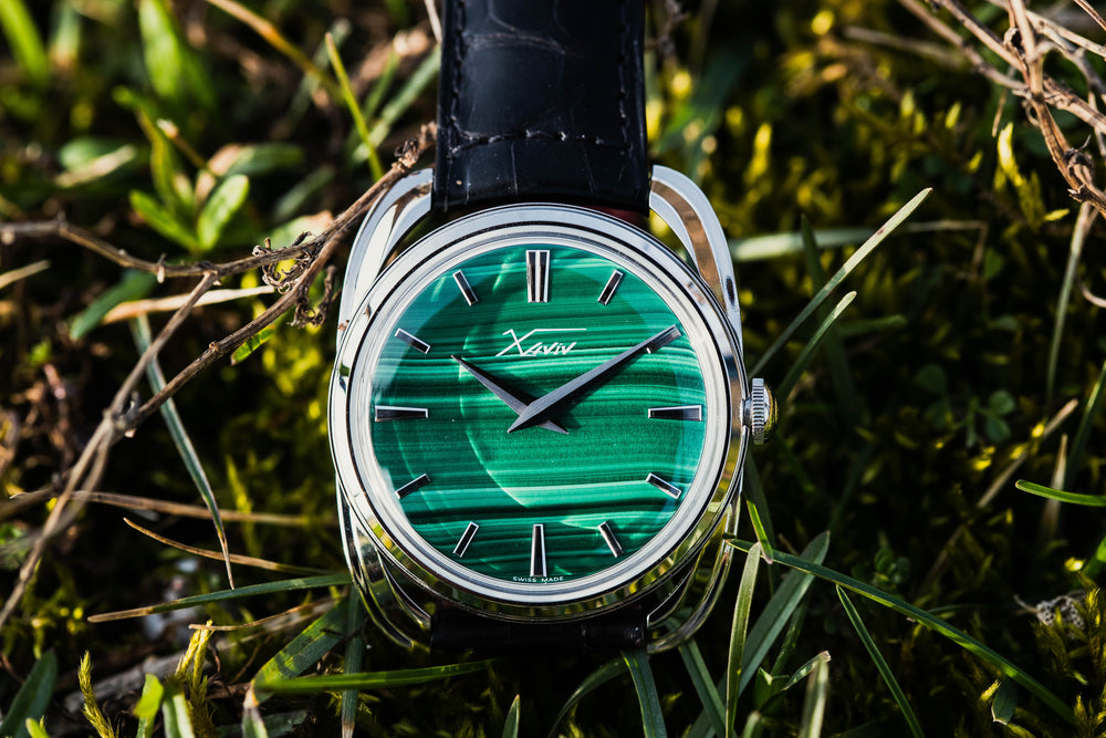 Xaviv Crablug 37 Malachite Stone Dialluxury dress watch in nature, handcrafted in La Chaux-de-Fonds, Switzerland, featuring hand-wound movement and refined design aesthetics
