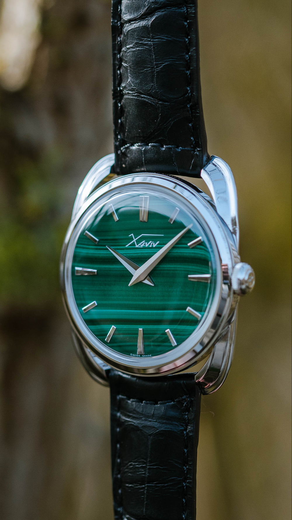 Xaviv Crablug 37 Malachite Stone Dialluxury dress watch in nature, handcrafted in La Chaux-de-Fonds, Switzerland, featuring hand-wound movement and refined design aesthetics