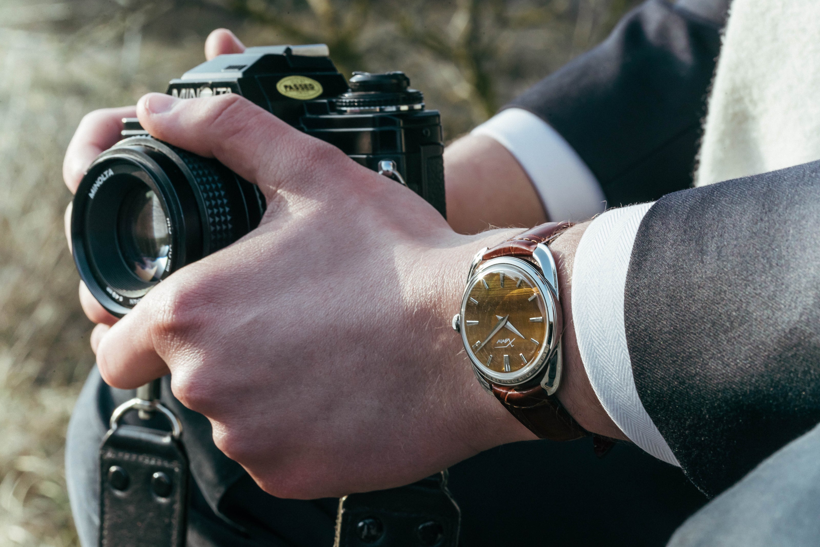 Xaviv Crablug 37 Tiger Eye Stone Dialluxury dress watch wristshot, handcrafted in La Chaux-de-Fonds, Switzerland, featuring hand-wound movement and refined design aesthetics